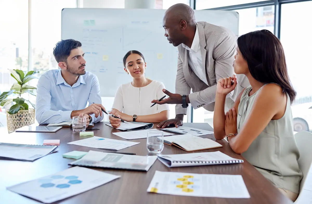 Team meeting in a modern office setting.